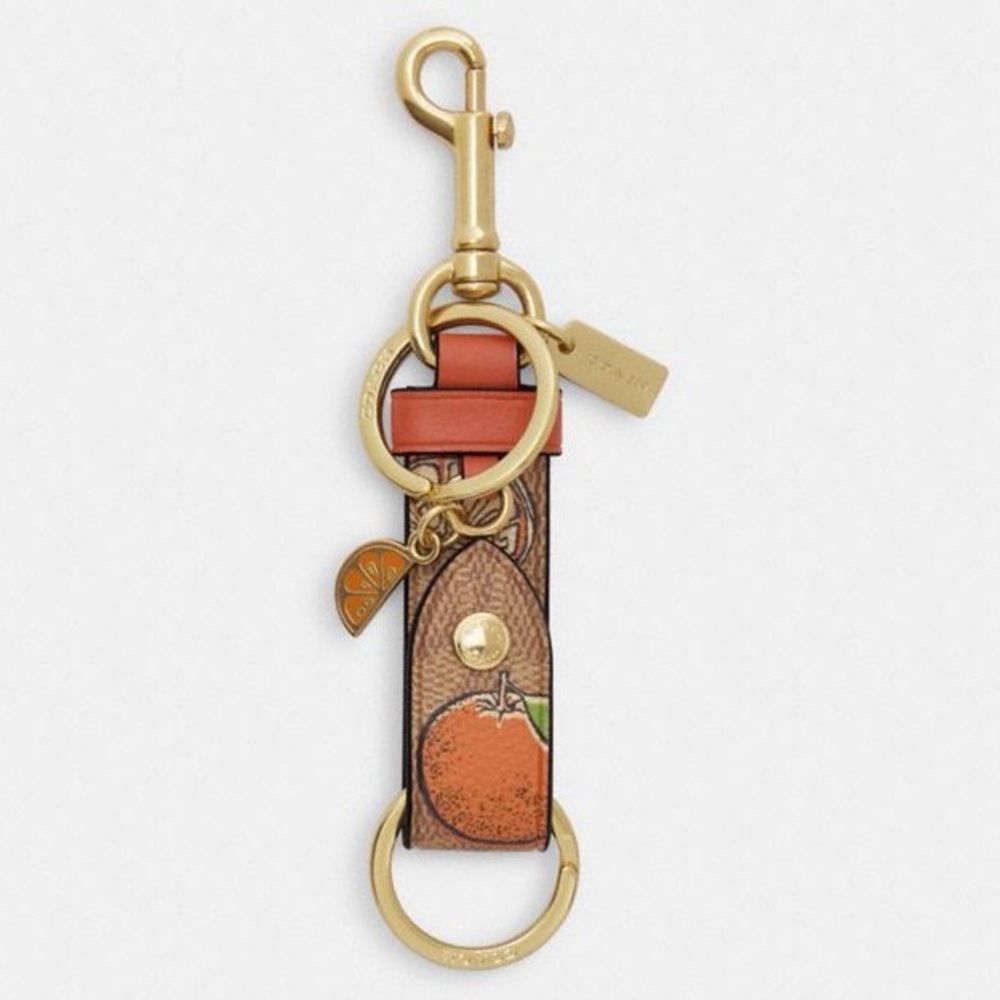 COACH #CAO46 Trigger Snap Bag Charm in Signature Canvas with Orange Print, NWT